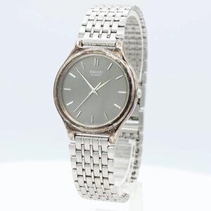 Vintage Seiko V701-1P70 Honeycomb Dial Men's Quartz Wristwatch Japan Steel